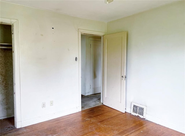 708 E State Route 72, Rolla, MO 65401 - unfurnished bedroom with wood finished floors and baseboards