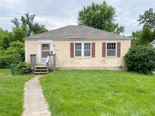 708 E State Route 72, Rolla, MO 65401 - view of front facade with a front lawn and a shingled roof