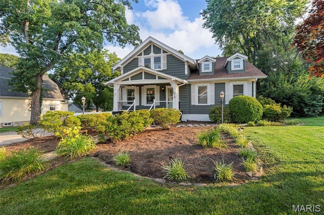317 Greeley Ave, Webster Groves, MO 63119 - view of front of property with a porch and a front lawn