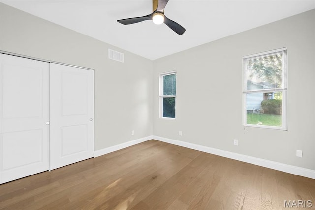 317 Greeley Ave, Webster Groves, MO 63119 - unfurnished bedroom with wood finished floors, a closet, and ceiling fan