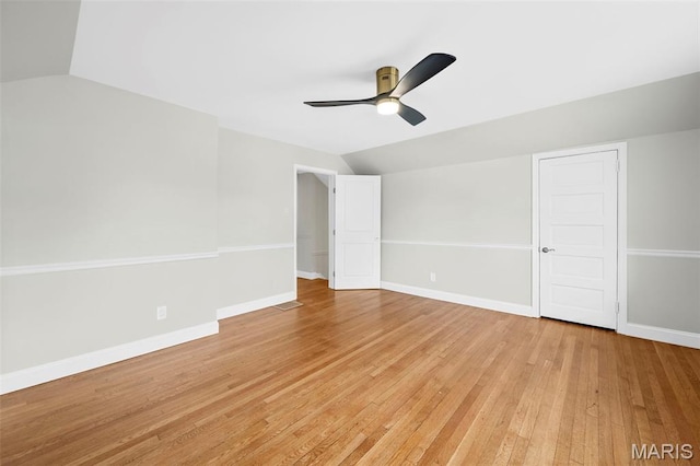 317 Greeley Ave, Webster Groves, MO 63119 - unfurnished room with lofted ceiling, a ceiling fan, and light wood-style flooring