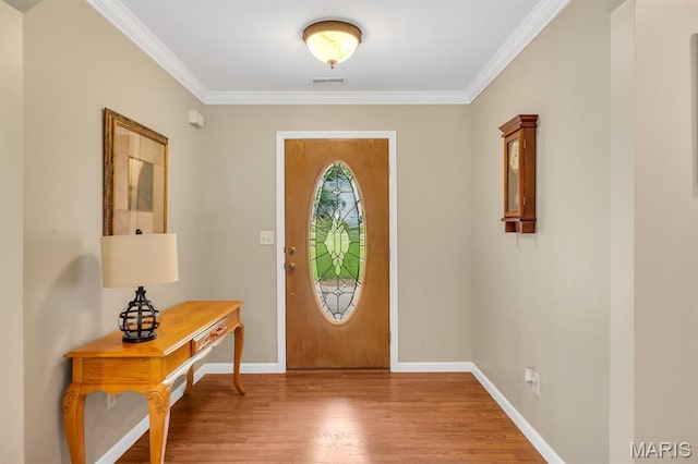 61 Serenity Ln, Troy, MO 63379 - foyer with wood finished floors, ornamental molding, and baseboards