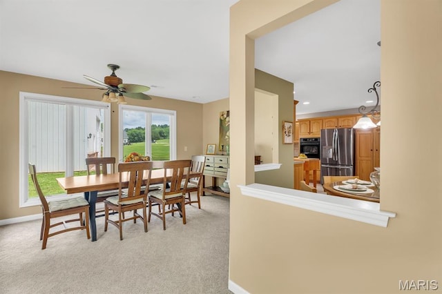 61 Serenity Ln, Troy, MO 63379 - dining room featuring ceiling fan, light carpet, baseboards, and recessed lighting