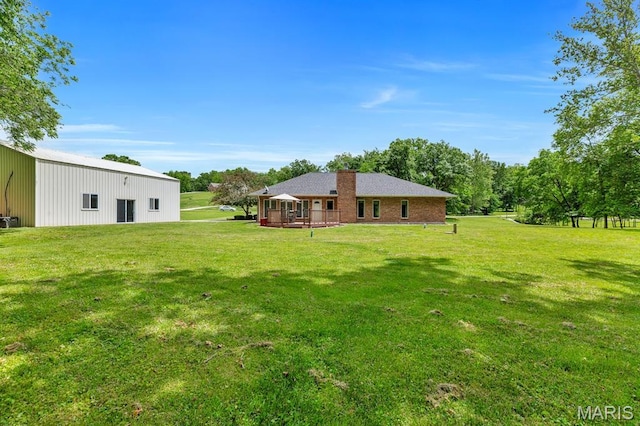 61 Serenity Ln, Troy, MO 63379 - view of green lawn with a pole building and an outdoor structure