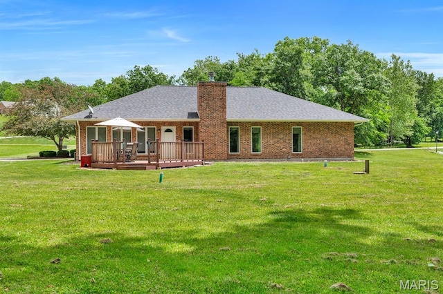 61 Serenity Ln, Troy, MO 63379 - rear view of house with a deck, a yard, and a chimney