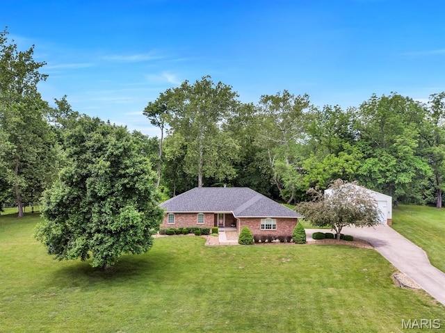 61 Serenity Ln, Troy, MO 63379 - ranch-style house with a front yard, driveway, and brick siding