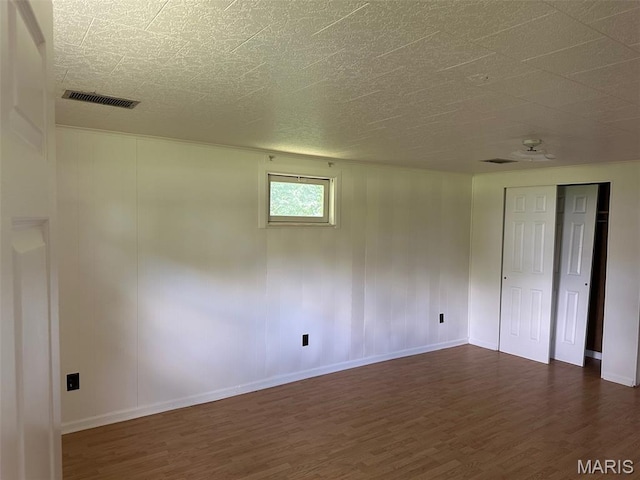 1707 Cross St, Ofallon, IL 62269 - spare room with dark wood finished floors and baseboards