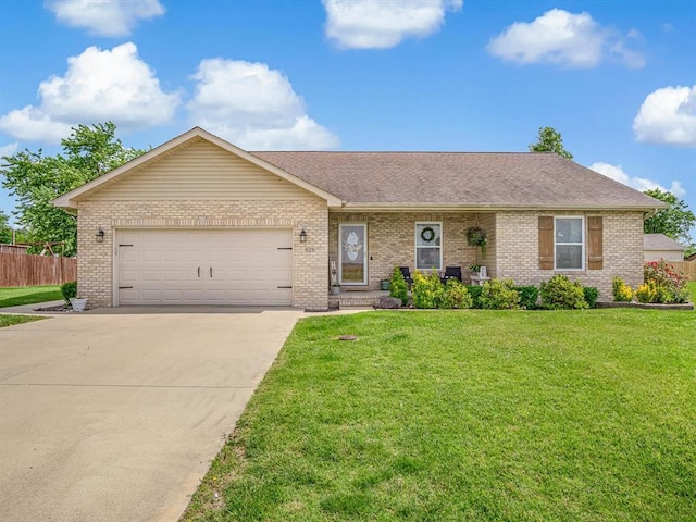 628 Hailie St, Saint Libory, IL 62282 - ranch-style house with brick siding, driveway, and a garage