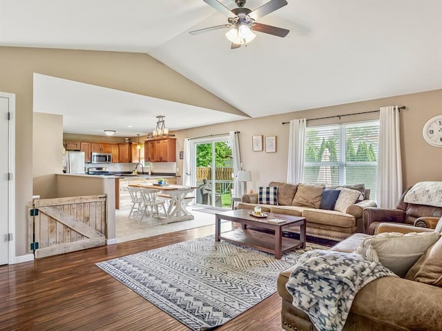 628 Hailie St, Saint Libory, IL 62282 - living room featuring vaulted ceiling, a ceiling fan, and wood finished floors