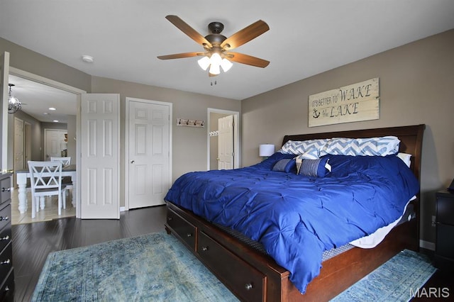 4800 Eagleview Dr Unit 113B, Osage Beach, MO 65065 - bedroom featuring wood finished floors, a ceiling fan, and baseboards
