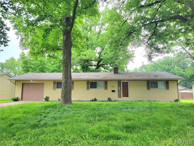 120 Juniper Dr, Belleville, IL 62221 - ranch-style house featuring a chimney, an attached garage, driveway, and a front yard