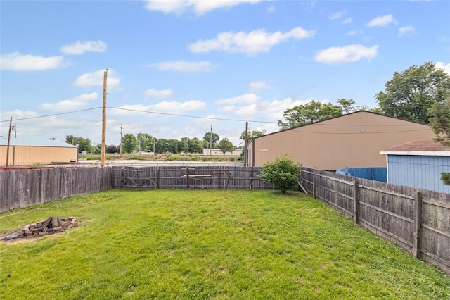 209 S Pence St, East Alton, IL 62024 - view of yard featuring a fire pit