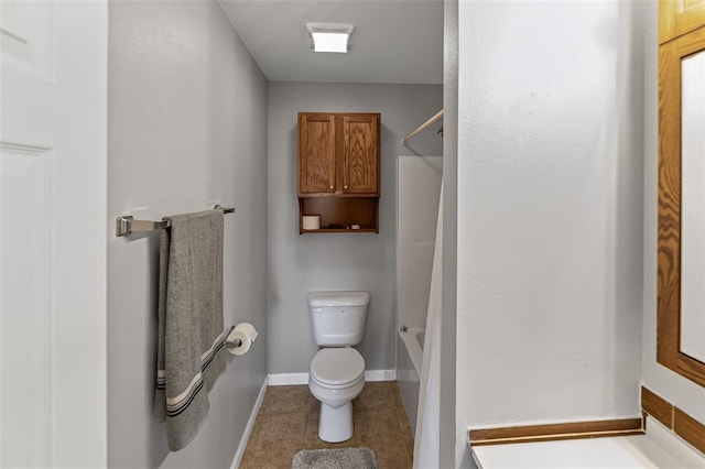 209 S Pence St, East Alton, IL 62024 - bathroom with toilet, tile patterned floors, shower / tub combo with curtain, and baseboards
