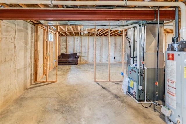 209 S Pence St, East Alton, IL 62024 - unfinished basement with gas water heater and heating unit