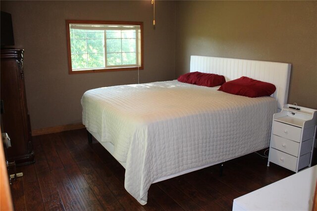 20143 State Highway 34, Piedmont, MO 63957 - bedroom featuring hardwood / wood-style flooring and baseboards