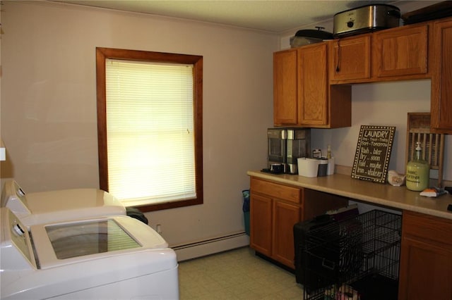 20143 State Highway 34, Piedmont, MO 63957 - kitchen with a baseboard heating unit, washer and clothes dryer, light countertops, light floors, and brown cabinets