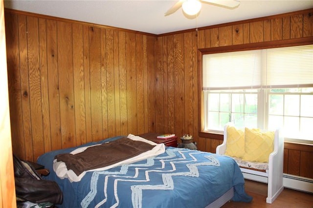 20143 State Highway 34, Piedmont, MO 63957 - bedroom with wooden walls and a ceiling fan