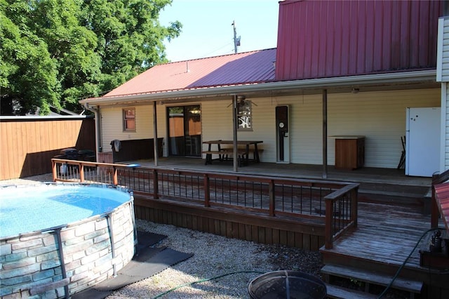 20143 State Highway 34, Piedmont, MO 63957 - back of house with metal roof and a wooden deck