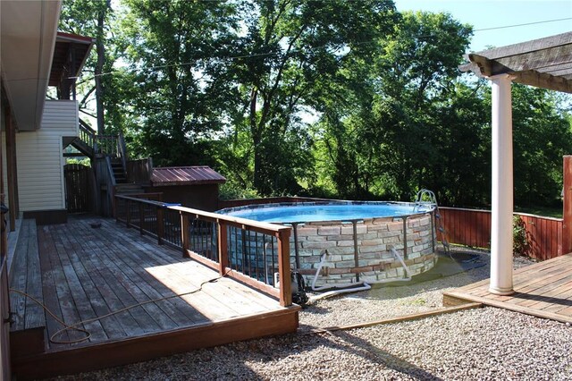 20143 State Highway 34, Piedmont, MO 63957 - deck featuring stairway and an outdoor pool
