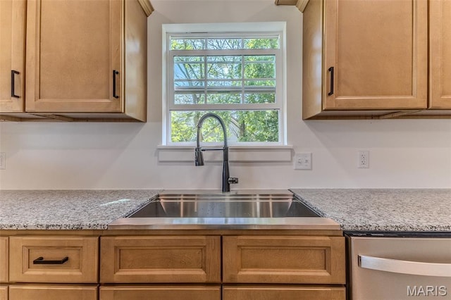 711 Noe Dr, Richland, MO 65556 - kitchen with a sink, stainless steel dishwasher, plenty of natural light, and light countertops