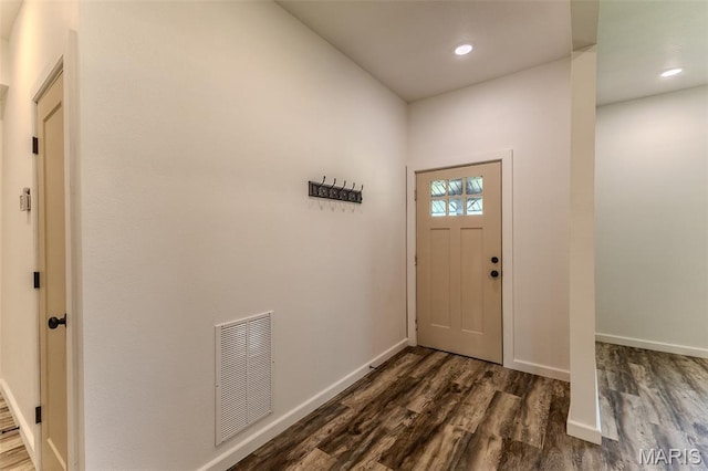711 Noe Dr, Richland, MO 65556 - foyer with dark wood finished floors, baseboards, and recessed lighting