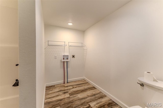 711 Noe Dr, Richland, MO 65556 - laundry room featuring hookup for an electric dryer, wood finished floors, hookup for a washing machine, baseboards, and recessed lighting