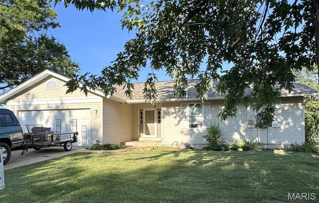 16 S Lang Dr, Ofallon, MO 63366 - ranch-style house with a garage and a front yard