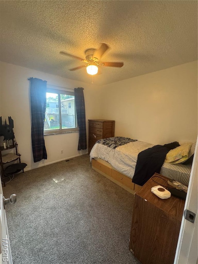 1956 Parkton W Dr, Barnhart, MO 63012 - carpeted bedroom with a textured ceiling and a ceiling fan