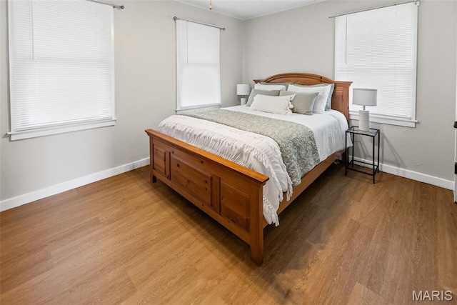 100 Bonds Ave, East Alton, IL 62024 - bedroom featuring light wood-style flooring and baseboards