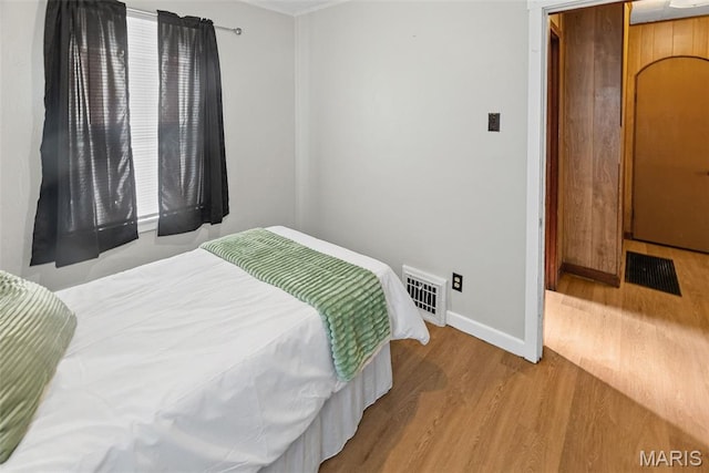 100 Bonds Ave, East Alton, IL 62024 - bedroom featuring wood finished floors and baseboards