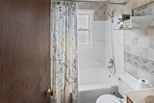 100 Bonds Ave, East Alton, IL 62024 - bathroom with toilet, shower / tub combo with curtain, vanity, and tile walls