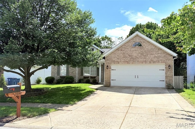 259 Jacob Ln, Ballwin, MO 63021 - view of front of home with brick siding, driveway, an attached garage, and a front yard