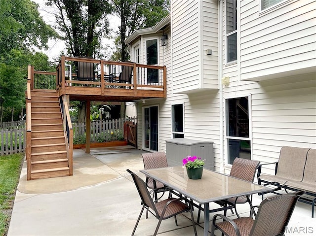 259 Jacob Ln, Ballwin, MO 63021 - view of patio with outdoor dining area, stairway, and a wooden deck