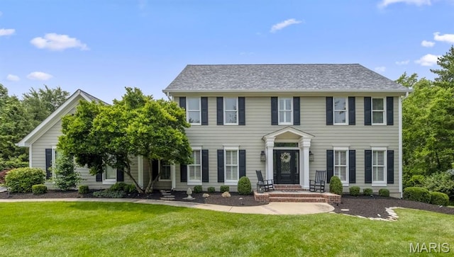 16434 Wilson Farm Dr, Chesterfield, MO 63005 - colonial inspired home featuring a front yard