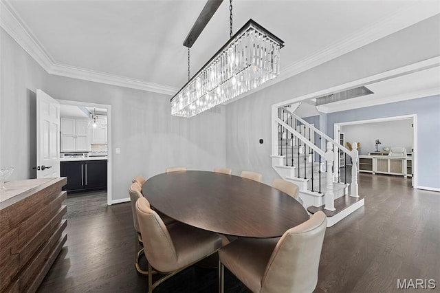 16434 Wilson Farm Dr, Chesterfield, MO 63005 - dining space featuring crown molding, dark wood-type flooring, baseboards, stairway, and a chandelier