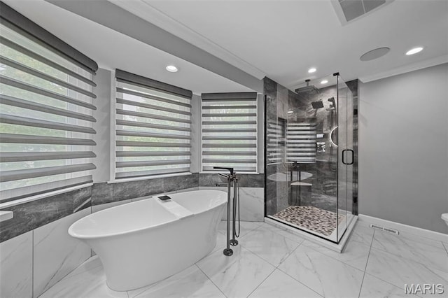 16434 Wilson Farm Dr, Chesterfield, MO 63005 - full bath featuring crown molding, marble finish flooring, a shower stall, a freestanding bath, and recessed lighting