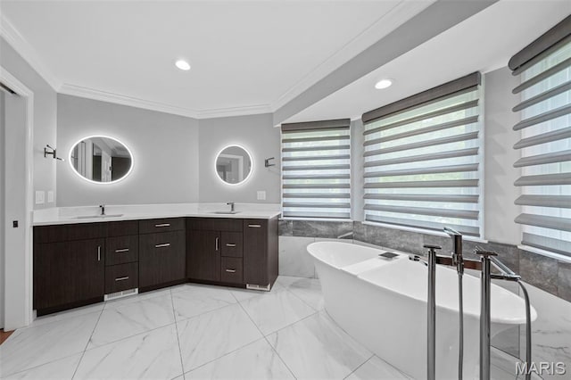 16434 Wilson Farm Dr, Chesterfield, MO 63005 - full bath featuring double vanity, a freestanding tub, crown molding, healthy amount of natural light, and marble look tile flooring