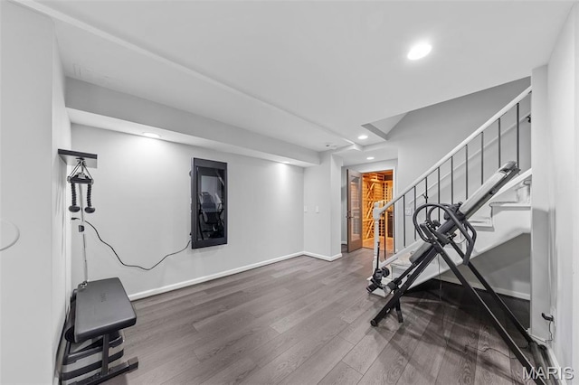 16434 Wilson Farm Dr, Chesterfield, MO 63005 - exercise area featuring wood finished floors, recessed lighting, and baseboards