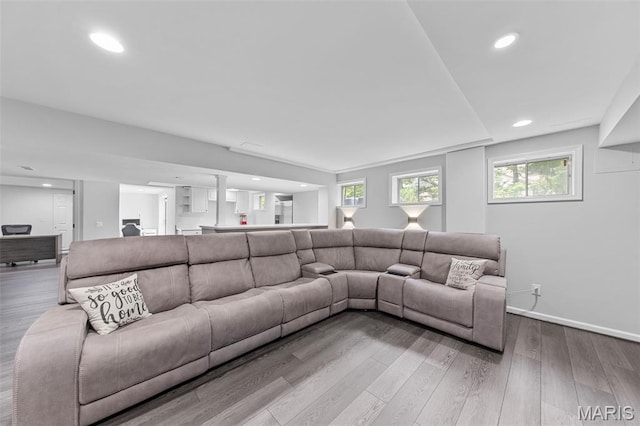 16434 Wilson Farm Dr, Chesterfield, MO 63005 - living room featuring wood finished floors, recessed lighting, and baseboards