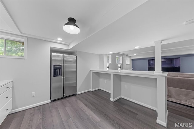 16434 Wilson Farm Dr, Chesterfield, MO 63005 - kitchen with high quality fridge, dark wood finished floors, baseboards, open floor plan, and recessed lighting