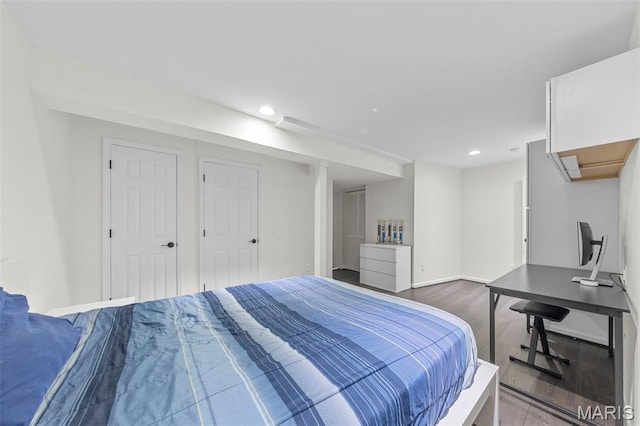 16434 Wilson Farm Dr, Chesterfield, MO 63005 - bedroom with wood finished floors, recessed lighting, and baseboards