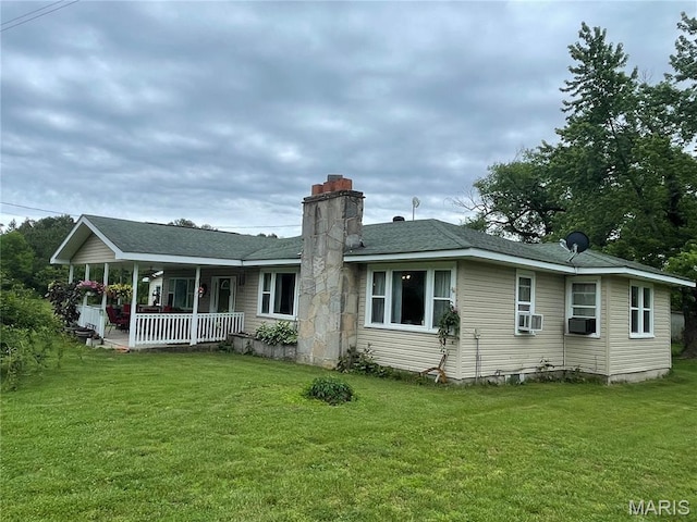 623 County Road 6590, Salem, MO 65560 - rear view of house with a porch, a chimney, a lawn, and cooling unit