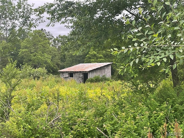 623 County Road 6590, Salem, MO 65560 - view of pole building featuring a view of trees