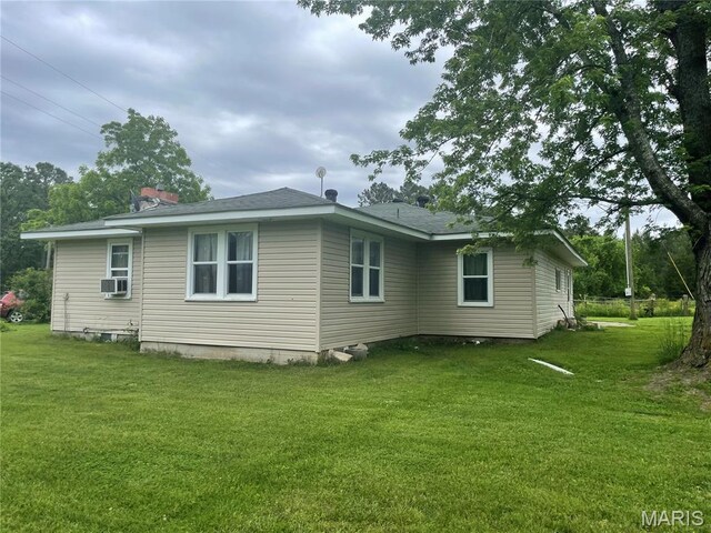 623 County Road 6590, Salem, MO 65560 - view of property exterior featuring a lawn and cooling unit
