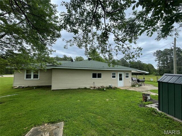 623 County Road 6590, Salem, MO 65560 - back of house with a yard and a patio area