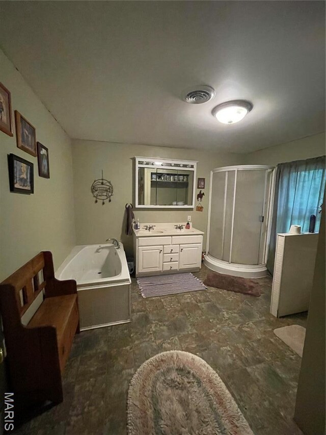 623 County Road 6590, Salem, MO 65560 - full bathroom featuring a stall shower, vanity, and a garden tub