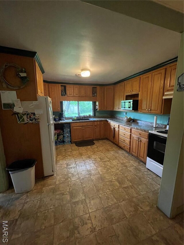 623 County Road 6590, Salem, MO 65560 - kitchen featuring electric stove, stainless steel microwave, brown cabinetry, and a sink