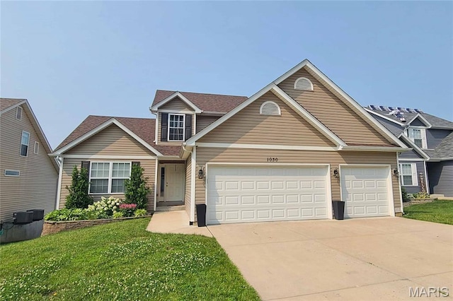 1030 Remington Dr, Imperial, MO 63052 - traditional-style house with driveway, an attached garage, and a front yard