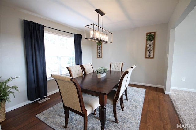 1030 Remington Dr, Imperial, MO 63052 - dining room with a chandelier and wood finished floors