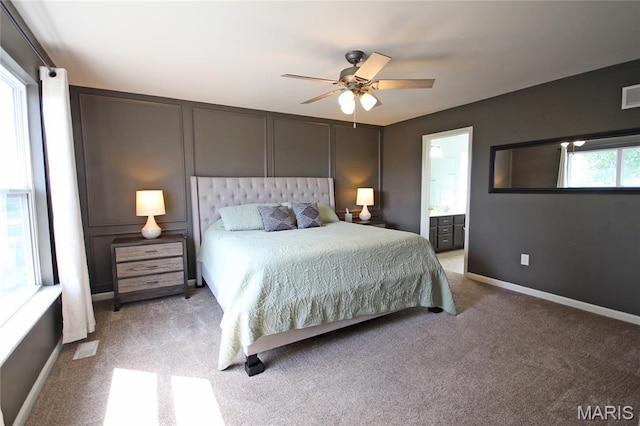 1030 Remington Dr, Imperial, MO 63052 - bedroom featuring light carpet, ensuite bathroom, and a ceiling fan